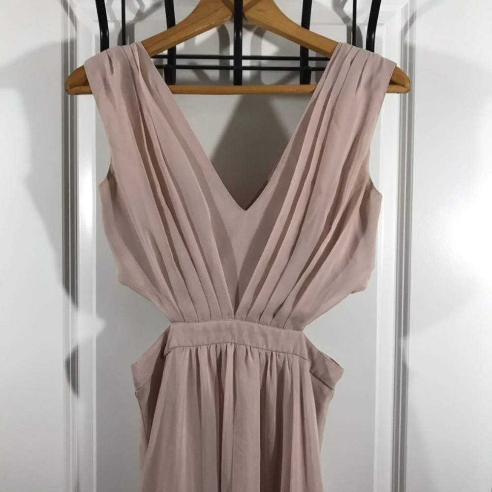 Pale pink maxi dress with waist cut outs.
